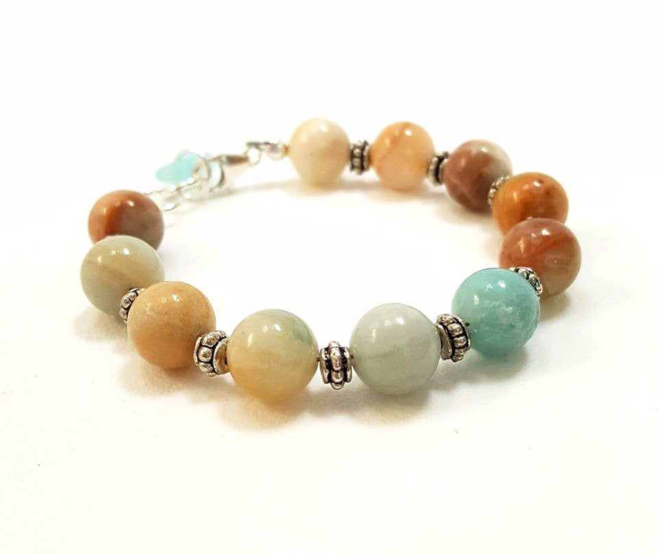 Boho bracelet with stone and aqua sea glass gem.